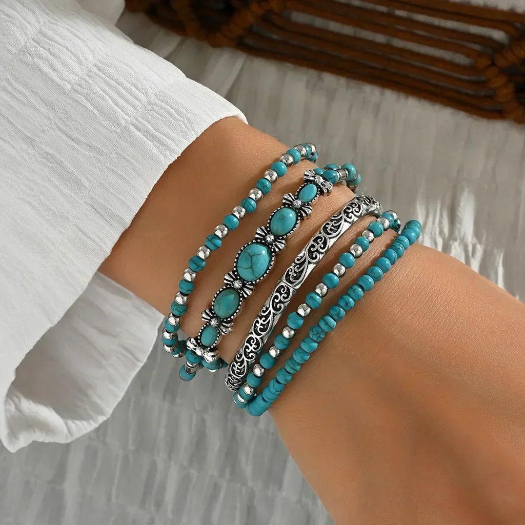 Conjunto de pulseras boho con perlas turquesa