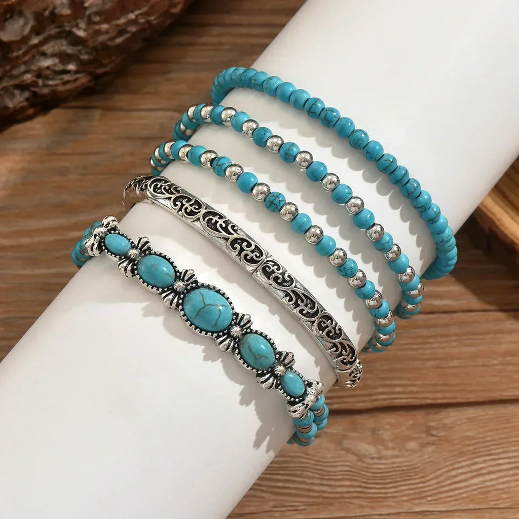 Conjunto de pulseras boho con perlas turquesa